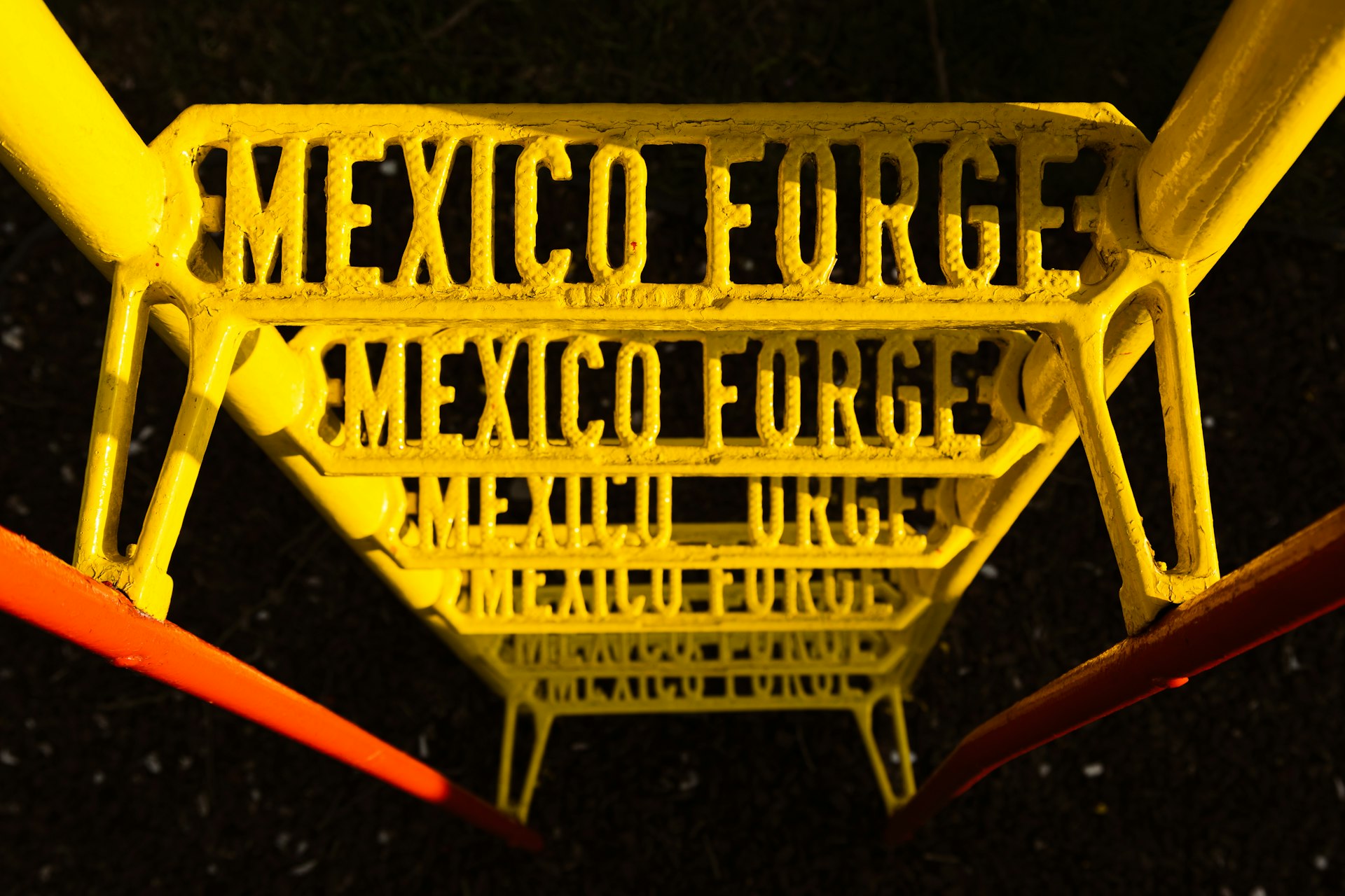 a yellow sign with black text